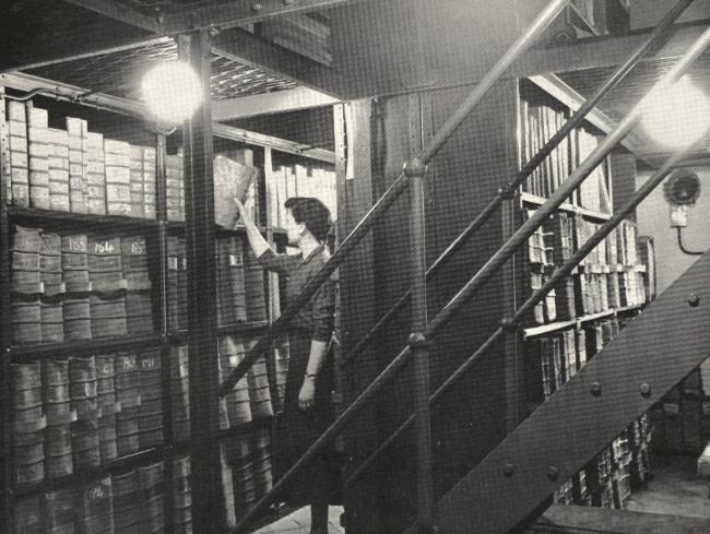 Norah Gurney in the Borthwick's strongroom at St Anthony's Hall